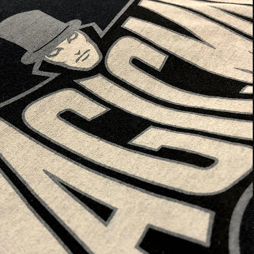 Black MagicMan Stealth Edition Vault t-shirt featuring a subtle superhero-inspired magician logo in muted cream and gray