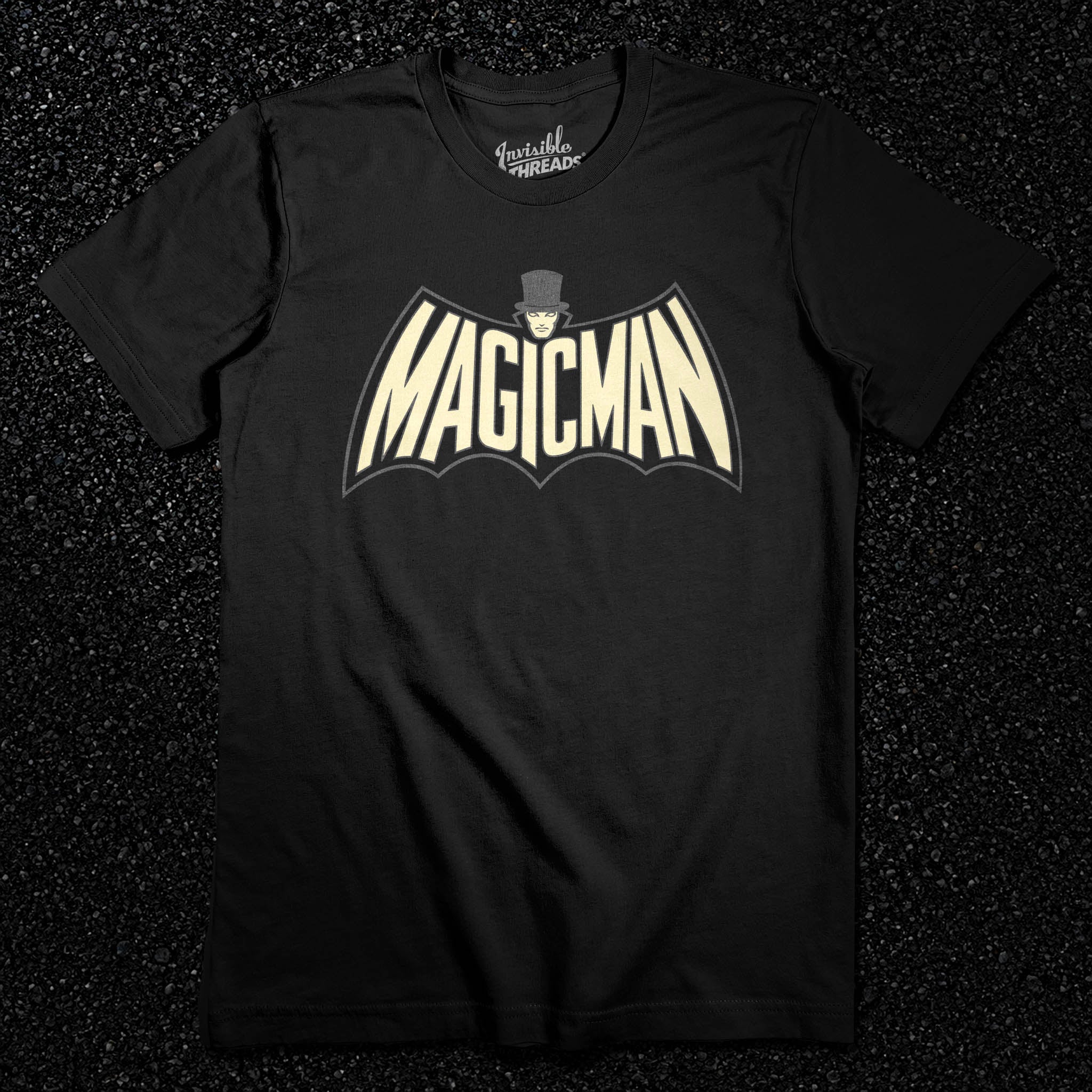Black MagicMan Stealth Edition Vault t-shirt featuring a subtle superhero-inspired magician logo in muted cream and gray