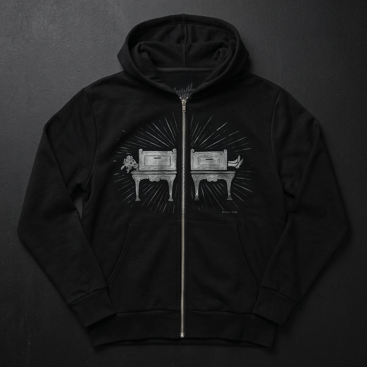 Black Saw Girl Hoodie Vault zip hoodie featuring a screen-printed vintage sawing illusion design split by the zipper