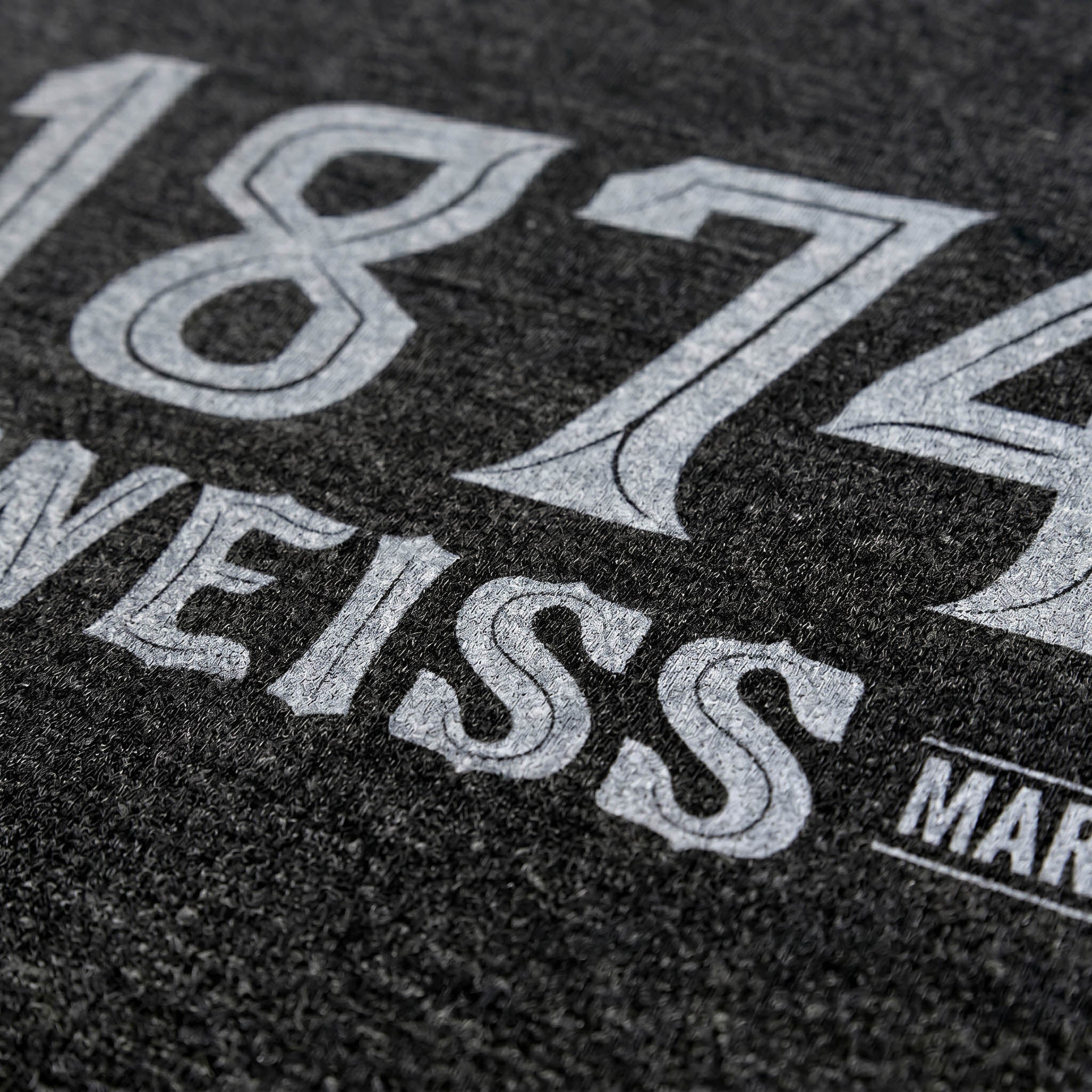 WEISS 1874 Vault t-shirt with Houdini-inspired front typography and centered WL&K monogram on the back
