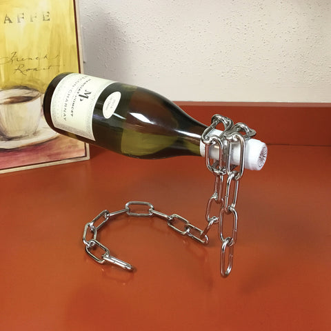 Chain suspension wine bottle holder by Invisible Threads
